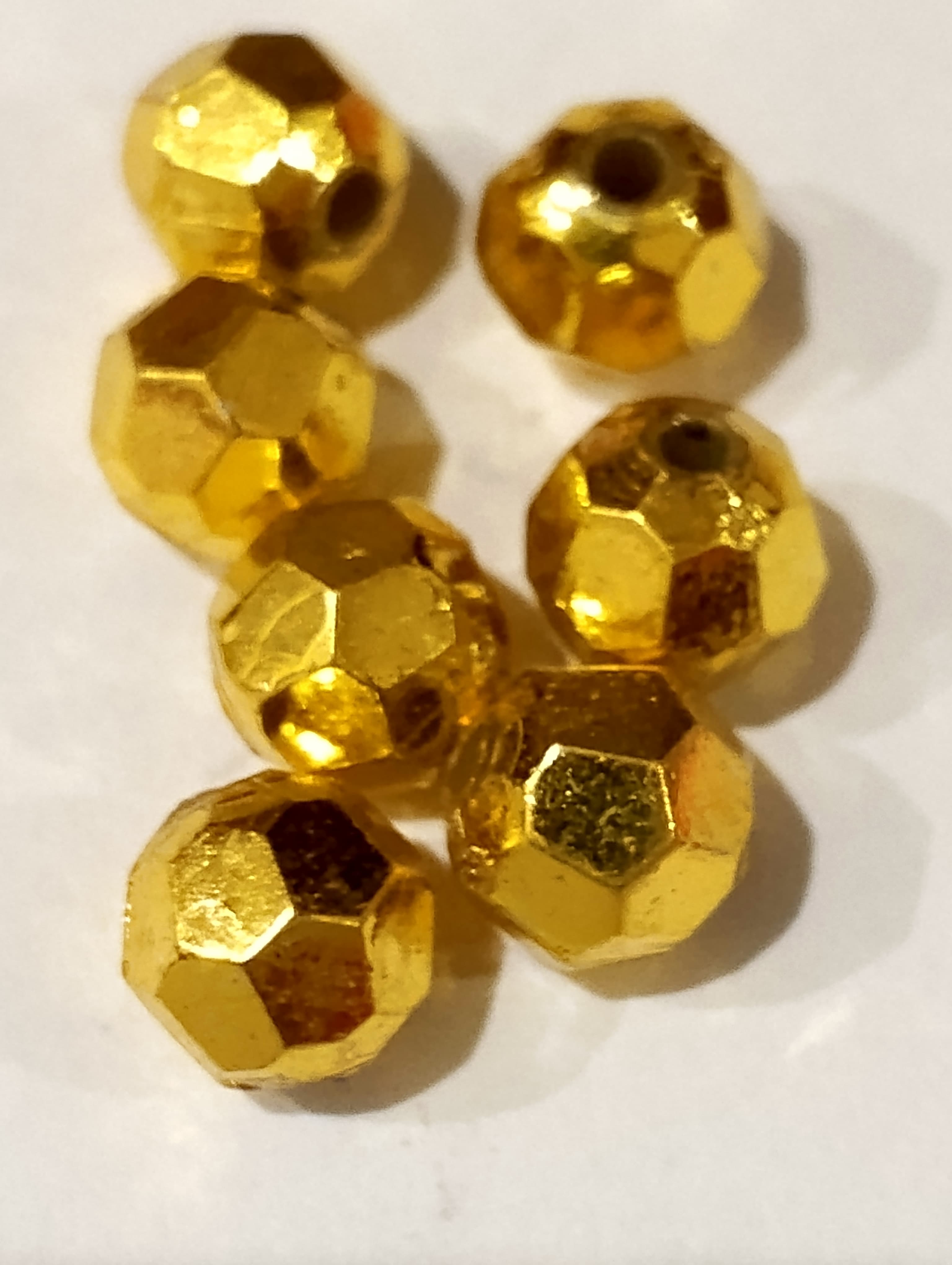 Golden Cut Round Spacer Plastic Beads. 6mm= 420 pcs / 4 strings. 5mm= 875 pcs / 5 strings. 3mm= 1248 pcs / 6 strings. For DIY Jewelry Making, Jewelry, Dress Accessories, Crafts, and Home Décor